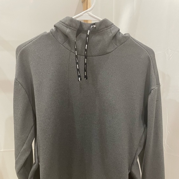 Small Gray Nike sweater. Lightly used, it has a front pouch hidden on the side. - Picture 2 of 5
